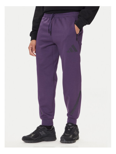 adidas Долнище анцуг Z.N.E. JW4726 Виолетов Loose Fit