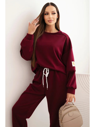 Kesi Włoski Ladies' butter set with a loose sweatshirt and pants with the inscription LOVE khaki