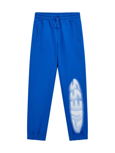 Детско спортно долнище в син цвят с надпис Guess