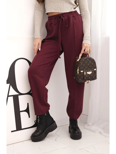 Kesi Włoski Elegant women's high-waisted trousers with a tie at the waist burgundy
