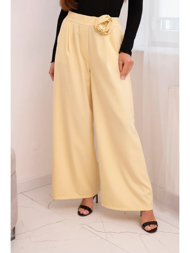 Kesi Włoski Women's elegant pants with wide legs and decorative flower yellow