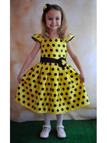 Празнична детска рокля в жълто на черно точки