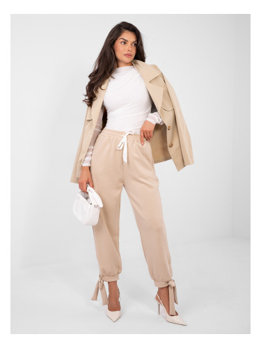 Бежови спортни панталони с връзки