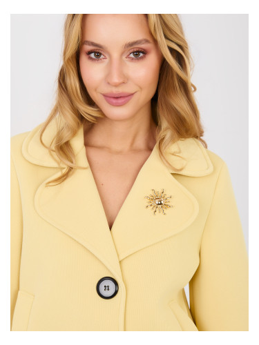Жълто палто с декорация