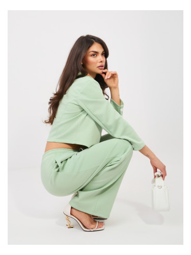 Комплект с двойно закопчаване в цвят шамфъстък, изработен от мек материал