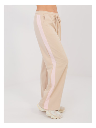Бежови спортни панталони с розови райета