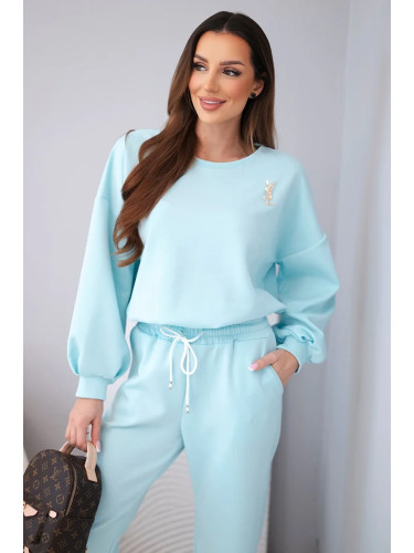 Дамски анцуг Kesi с брошка в цвят масло