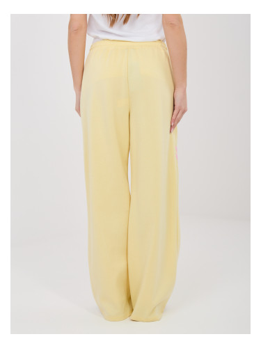 Пастелно жълти спортни панталони