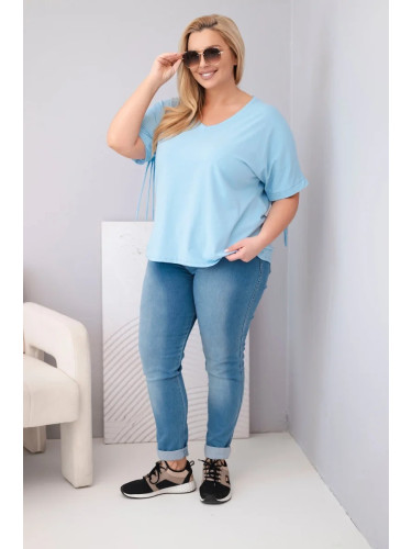 Оувърсайз блуза с V-образно деколте и пискюли