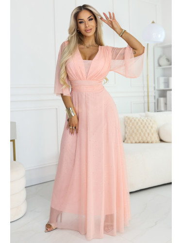 Дълга блестяща рокля с деколте и прозрачни ръкави