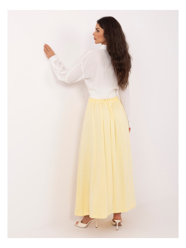 Ярко жълта макси пола, изработена от мек материал