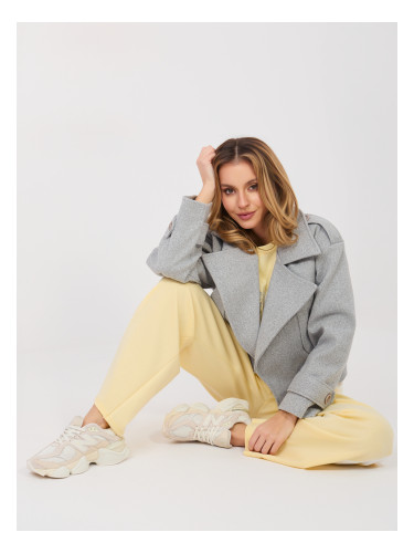 Жълти спортни панталони от трико с райета