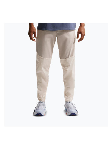 Мъжки панталони за бягане Nike Stride Repel Woven cream li/birch/natural