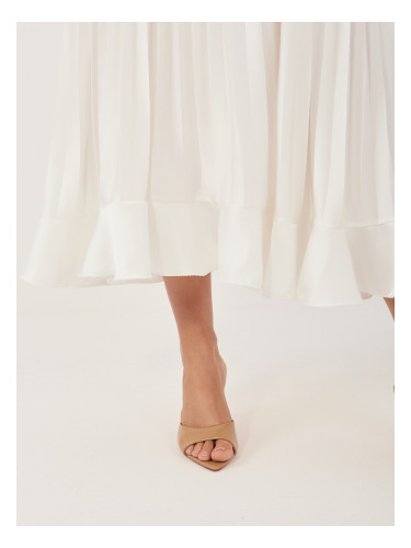 Кремаста плисирана пола с волан