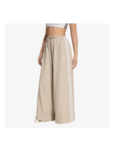 Потници adidas Originals Firebird Adilenium Track Pant UNISEX Khaki Three/ White L
