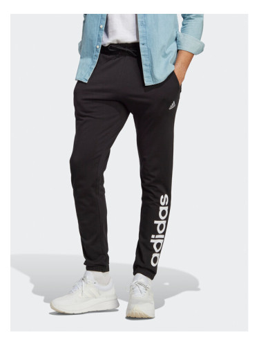 adidas Долнище анцуг Essentials Single Jersey Tapered Elasticized Cuff Logo Joggers IC0055 Черен Regular Fit