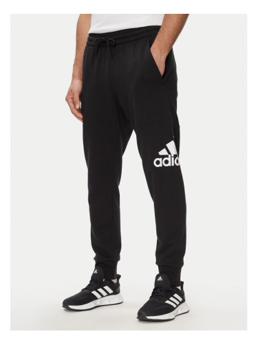 adidas Долнище анцуг Essentials French Terry Tapered Cuff Logo Joggers HA4342 Черен Regular Fit