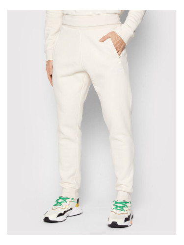 adidas Долнище анцуг adicolor Essentials HE9410 Бежов Slim Fit