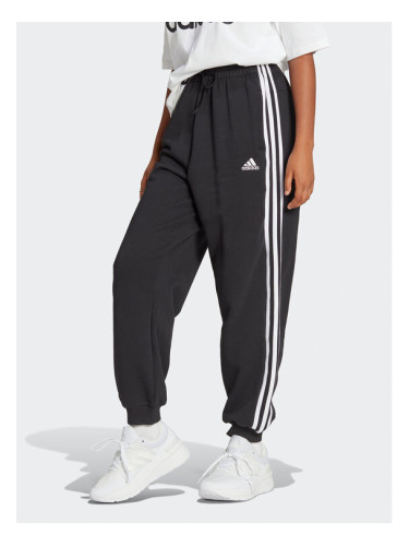 adidas Долнище анцуг Essentials 3-Stripes French Terry Loose-Fit Joggers HA4375 Черен Loose Fit