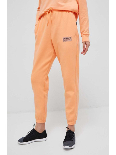 Спортен панталон Under Armour в оранжево с изчистен дизайн