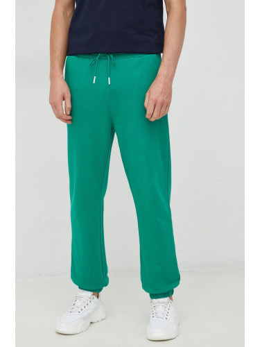 Памучен спортен панталон United Colors of Benetton в зелено с принт