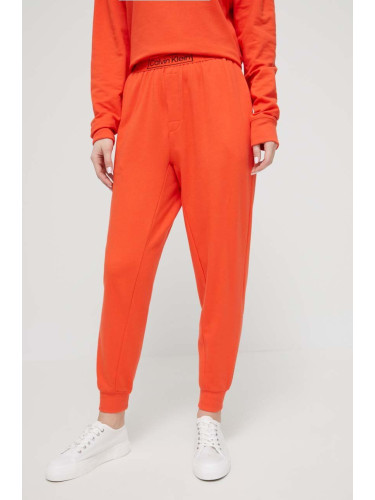 Домашен панталон Calvin Klein Underwear в оранжево с изчистен дизайн