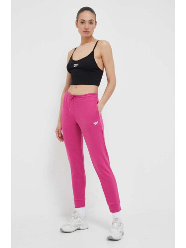 Спортен панталон Reebok в розово с изчистен дизайн