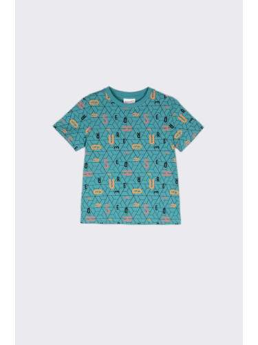 Детска памучна тениска Coccodrillo в тюркоазено с десен