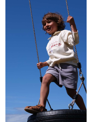 Детска блуза с дълги ръкави Konges Sløjd в бежово с апликация