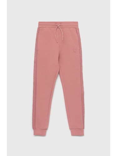 Детски спортен панталон Guess в розово с изчистен дизайн
