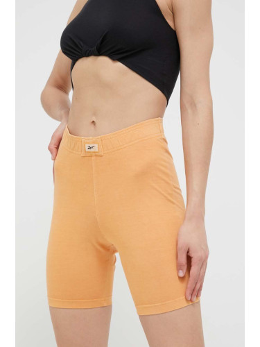 Къс панталон Reebok Classic в оранжево с изчистен дизайн с висока талия