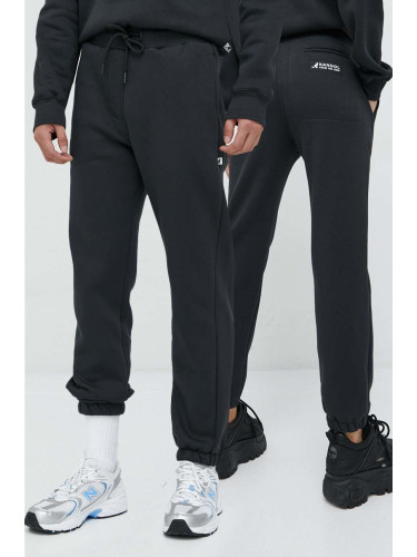 Спортен панталон Kangol унисекс в черно с изчистен дизайн