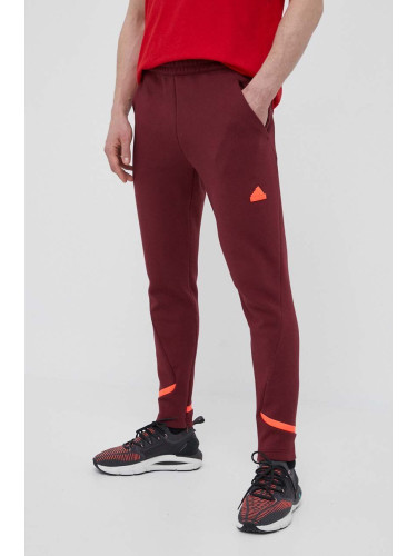 Спортен панталон adidas в бордо с апликация