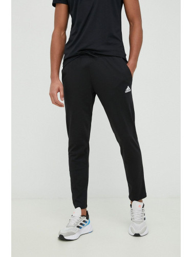Панталон за трениране adidas Essentials в черно с изчистен дизайн