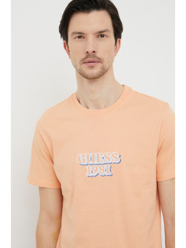 Памучна тениска Guess в оранжево с апликация