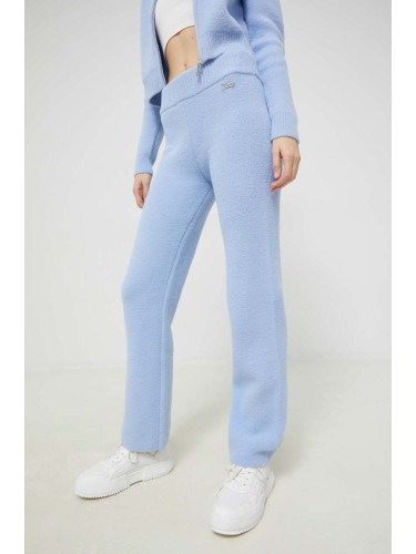 Спортен панталон Juicy Couture в синьо с изчистен дизайн