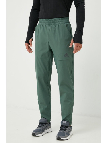 Спортен панталон adidas в зелено с изчистен дизайн