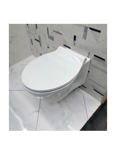 Стенна тоалетна чиния с тънка седалка и капак GURAL VIT Crystal Alba 46994