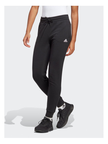 adidas Долнище анцуг Essentials Linear French Terry Cuffed Joggers IC6868 Черен Slim Fit