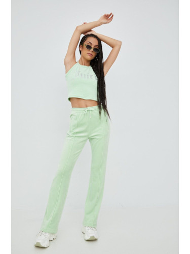 Спортен панталон Juicy Couture в зелено с апликация