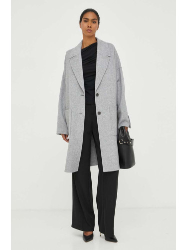 Вълнено палто BOSS в сиво преходен модел с уголемена кройка