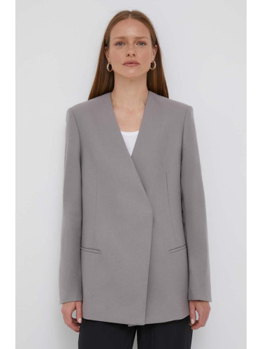 Вълнено сако Calvin Klein в сиво с уголемена кройка с изчистен дизайн