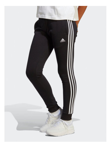 adidas Долнище анцуг Essentials 3-Stripes French Terry Cuffed Joggers IC8770 Черен Slim Fit