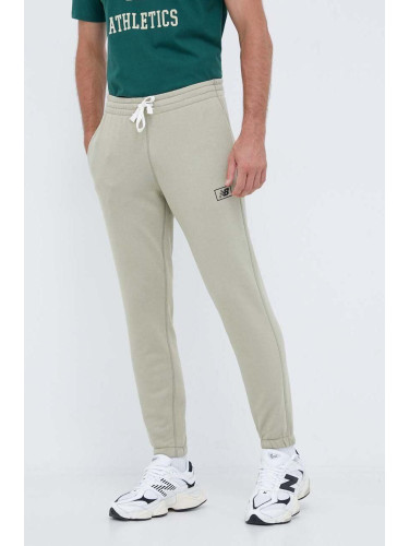 Спортен панталон New Balance в зелено с изчистен дизайн