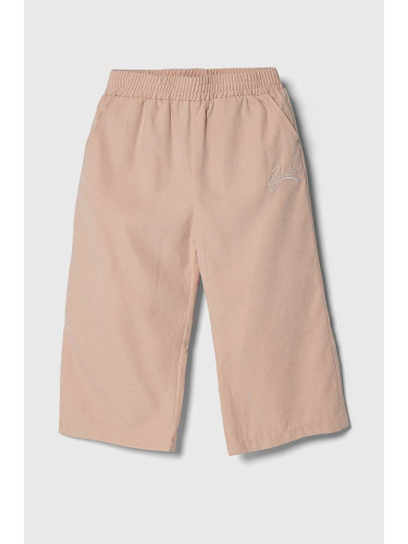 Детски панталон Guess в розово с изчистен дизайн