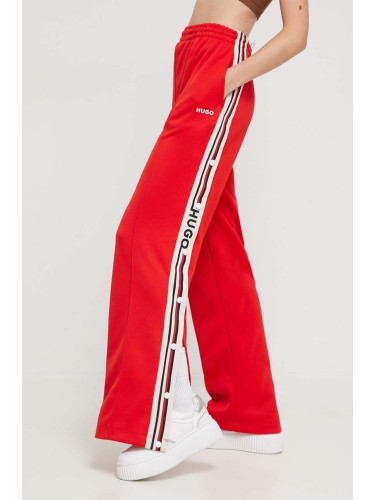 Спортен панталон HUGO в червено с апликация