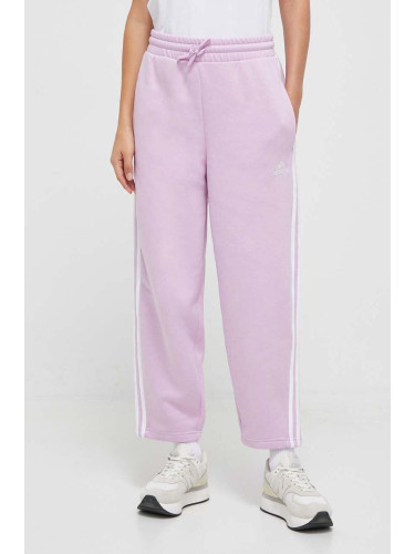 Спортен панталон adidas в розово с апликация