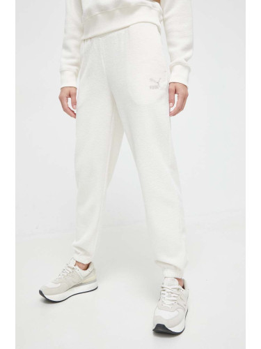 Спортен панталон Puma в бежово с изчистен дизайн