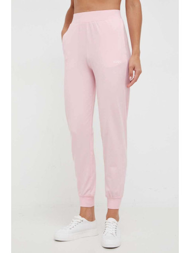 Домашен панталон HUGO в розово с изчистен дизайн 50490578