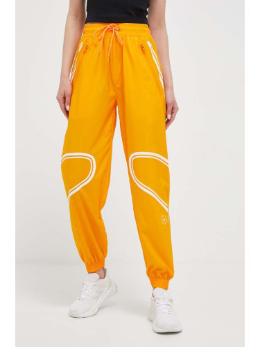 Панталон за трениране adidas by Stella McCartney TruePace в оранжево с принт